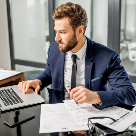 tax-manager-working-at-the-office